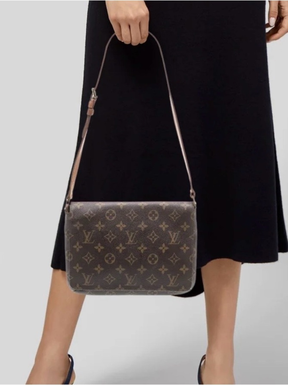 Louis Vuitton Monogram Canvas
Musette Tango Bag purse
